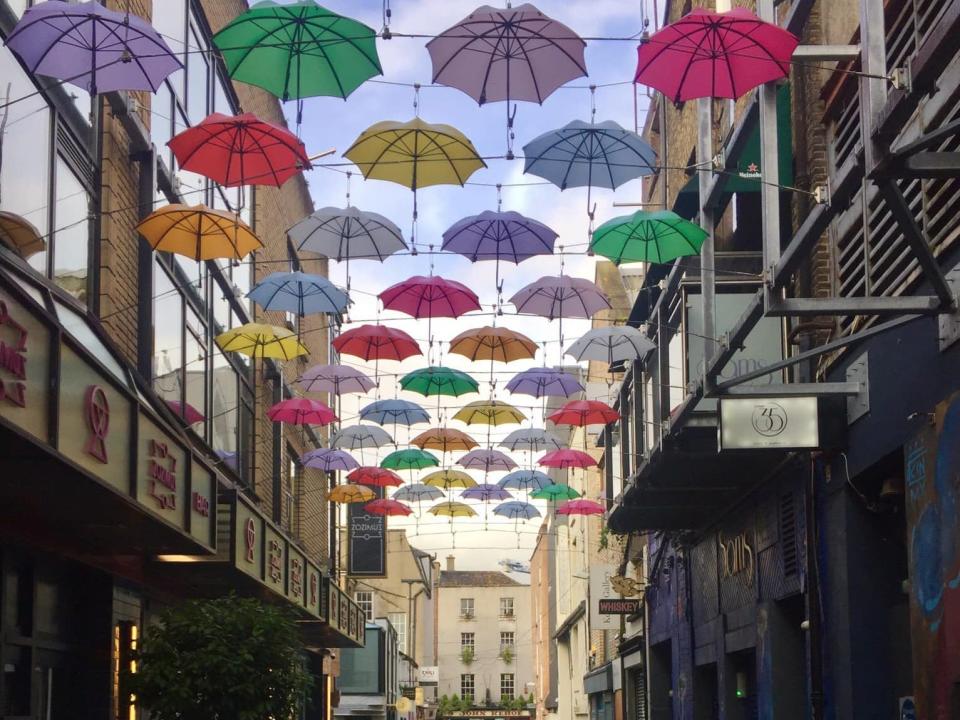 umbrella art installation on a street in dublin ireland