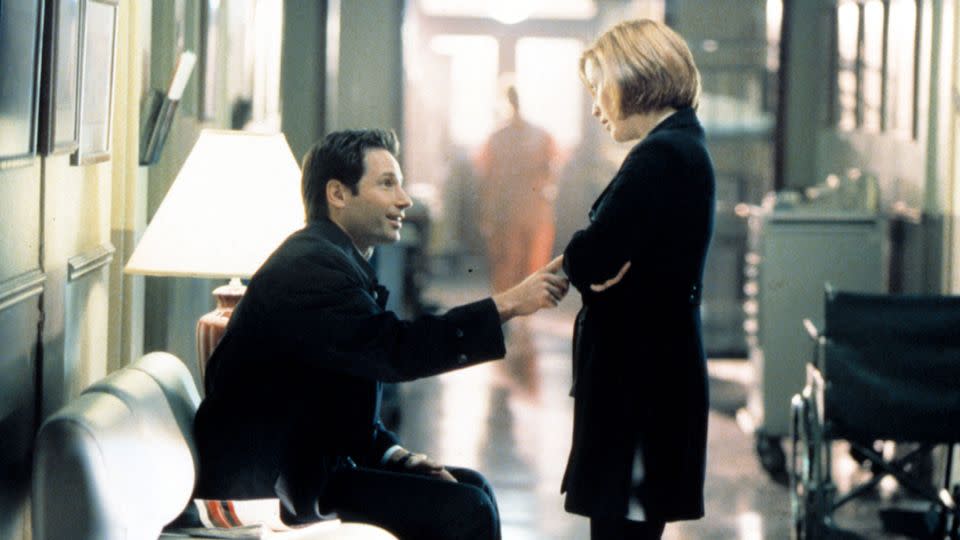 The nature of Mulder and Scully's relationship was hotly debated by X-Philes, leading to the birth of the term "shipper" as a label for fans who rooted for a romantic pairing between the two characters. The word transcends fandoms and is widely used in pop culture today. - 20th Century Fox/Everett Collection