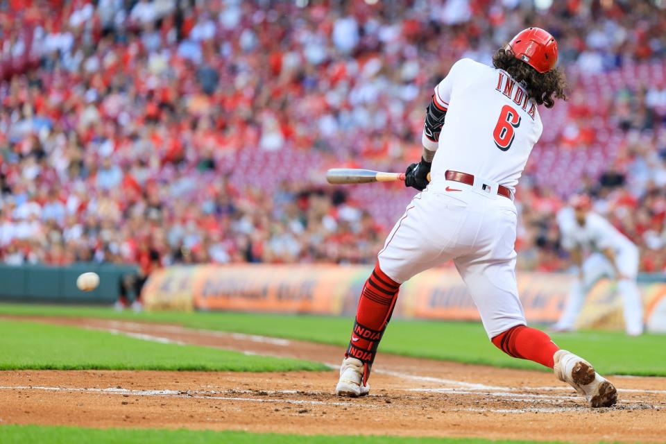 Cincinnati Reds' Jonathan India hits an RBI-groundout during the second inning of a baseball game against the New York Mets in Cincinnati, Tuesday, May 9, 2023.