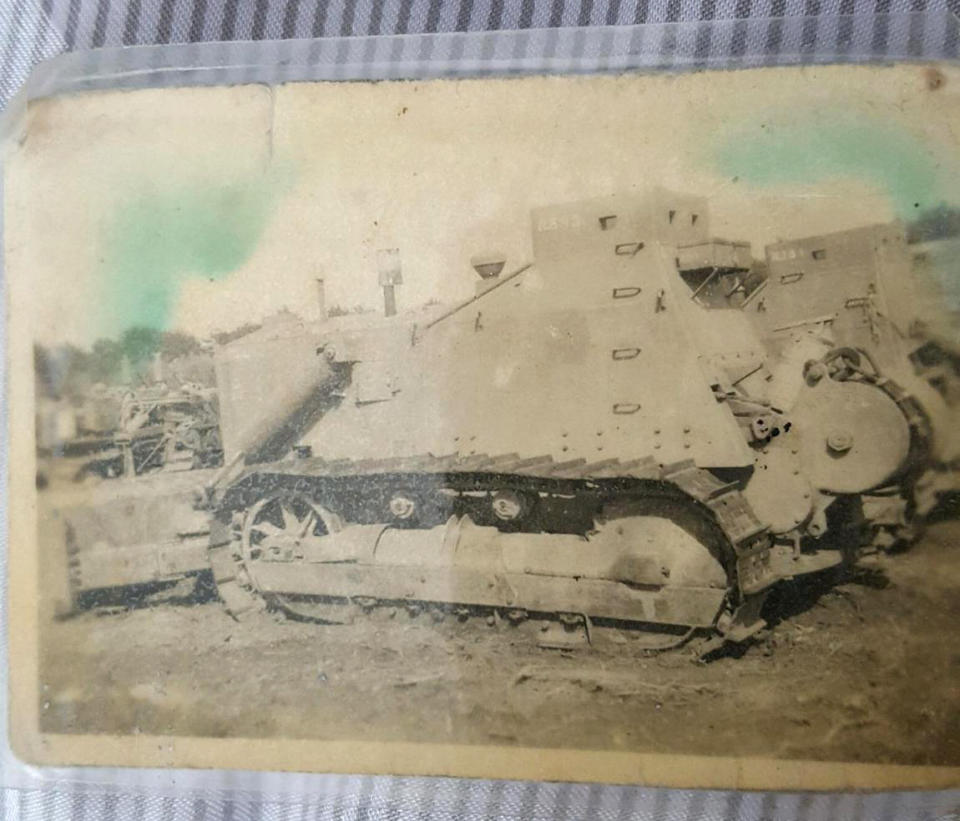 This family photo provided by Kelly Adsero shows a photo of an armored bulldozer driven by Adsero's grandfather Bill Chambers when he was a member of the Canadian Army. Chambers, 97, died March 14, 2020, at an adult family home where he lived with four other World War II veterans. He wasn't obviously ill, but tested positive for the new coronavirus after he died. (Courtesy of Kelly Adsero via AP)