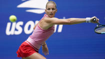 Karolina Pliskova, of the Czech Republic, returns a shot to Aryna Sabalenka, of Belarus, during the quarterfinals of the U.S. Open tennis championships, Wednesday, Sept. 7, 2022, in New York. (AP Photo/Seth Wenig)