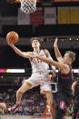 Southern California guard Drew Peterson, left, shoots as Stanford forward Lukas Kisunas defends during the first half of an NCAA college basketball game Thursday, Jan. 27, 2022, in Los Angeles. (AP Photo/Mark J. Terrill)