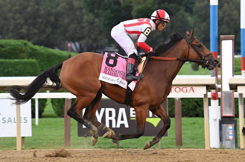 Randomized wins the Grade I Alabama at Saratoga. Photo by Susie Raisher, courtesy of New York Racing Association