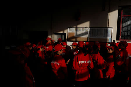 Members of firefighter school attend a training session in Oliveira do Hospital, Portugal November 10, 2018. Picture taken November 10, 2018. REUTERS/Rafael Marchante