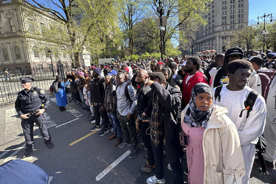 FILE Over 1,500 immigrants came to City Hall to draw attention to racial inequities in the city's shelter and immigrant support systems in New York on Tuesday, April 16, 2024. On Friday, April 19, The Associated Press reported on stories circulating online incorrectly claiming immigrants in the U.S. illegally on Tuesday stormed New York City Hall, demanding housing in luxury hotels rather than city shelters.(AP Photo/Ted Shaffrey, File)