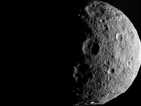 The shadowy outlines of the terrain in Vesta's northern region are visible in this image from NASA's Dawn spacecraft. The image comes from the last sequence of images Dawn obtained of the giant asteroid Vesta as it departed the giant asteroid S