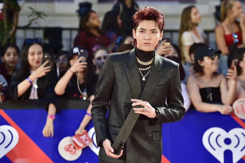 FILE - Singer Kris Wu celebrates his award for Fan Fave New Artist on the red carpet at the iHeartRadio MMVAs in Toronto on Aug. 26, 2018. A Beijing court on Friday, Nov. 25, 2022 sentenced Chinese-Canadian pop star Kris Wu to 13 years in prison on charges including rape. (Frank Gunn/The Canadian Press via AP, File)
