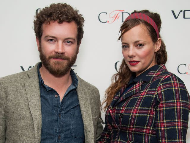 <p>Valerie Macon/Getty </p> Danny Masterson and Bijou Phillips in 2014