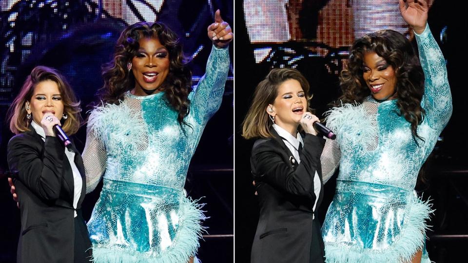 Maren Morris in a black suit performs with Alexia Noelle Paris in a turquoise leotard at the Love Rising: Let Freedom Sing (and Dance) A Celebration Of Life, Liberty And The Pursuit Of Happiness show