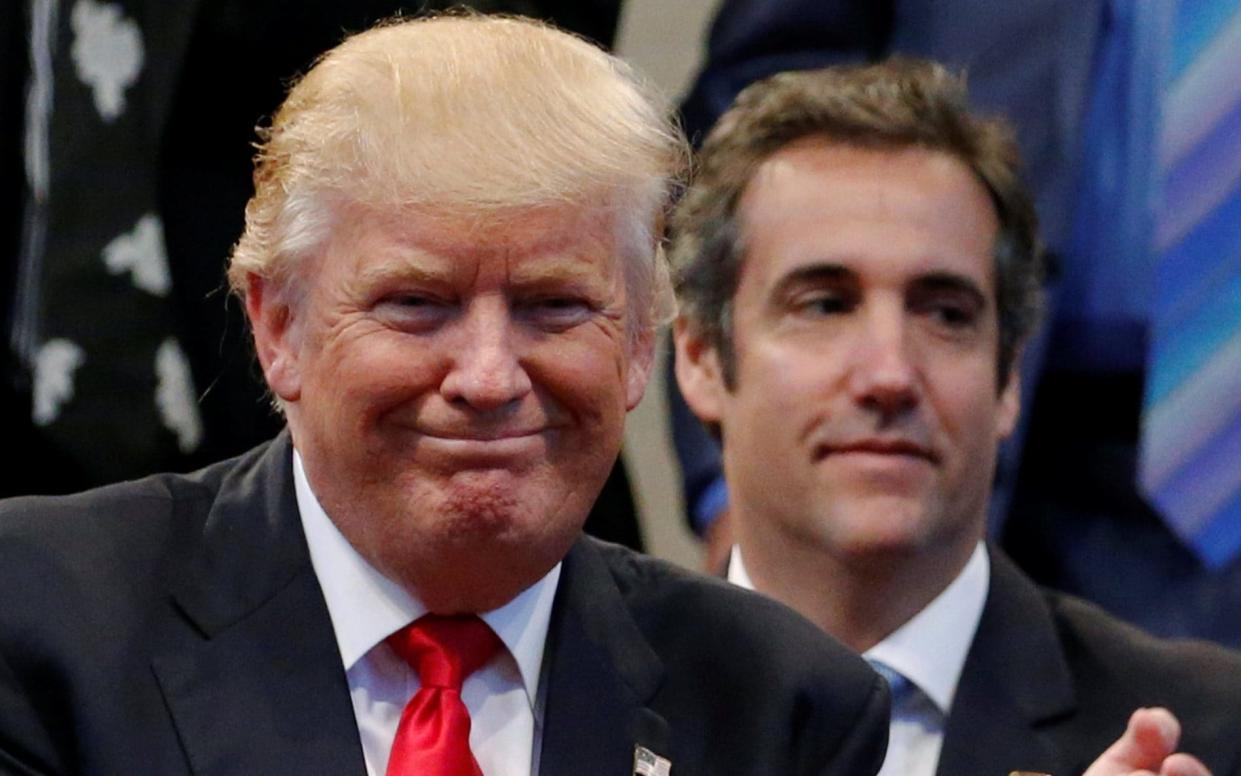 Cohen is thought to be cooperating with the Russia investigation after becoming embroiled in inquiries over hush money - REUTERS