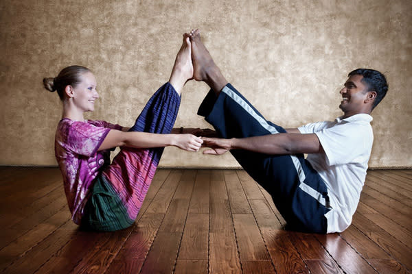 6 Couple Yoga Poses to Help You Bond With Your Partner