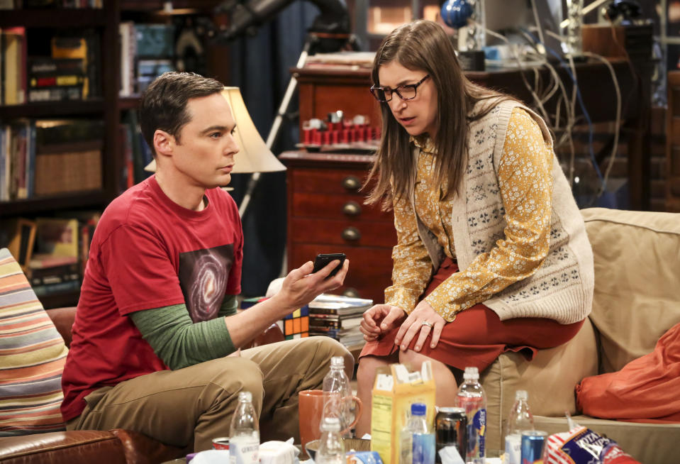 This image released by CBS shows Jim Parsons, left, and Mayim Bialik in a scene from the series finale of "The Big Bang Theory," airing on Thursday. (Michael Yarish/CBS via AP)