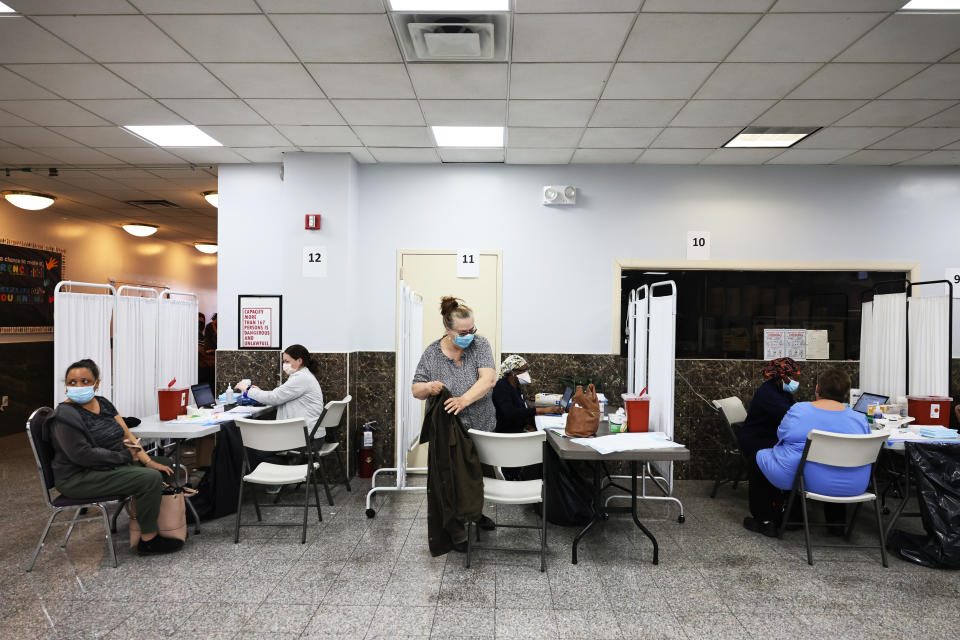 People prepare to be administered the Johnson & Johnson coronavirus (COVID-19) vaccine at the Northwell Health pop-up coronavirus (COVID-19) vaccination site at the Albanian Islamic Cultural Center in Staten Island on April 08, 2021 in New York City. (Michael M. Santiago/Getty Images)