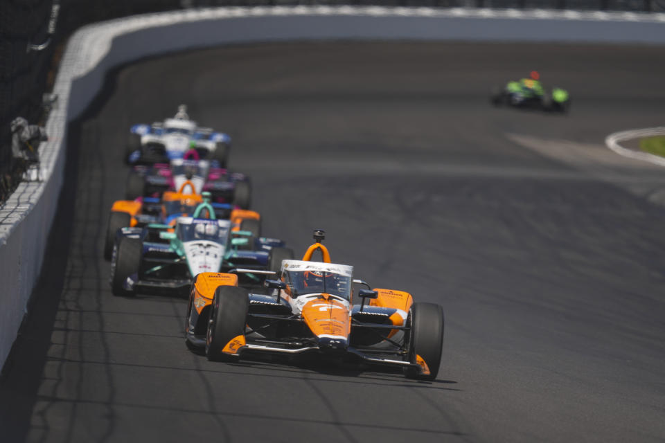 Alexander Rossi drives into the second turn during the final practice for the Indianapolis 500 auto race at Indianapolis Motor Speedway in Indianapolis, Friday, May 24, 2024. (AP Photo/Michael Conroy)