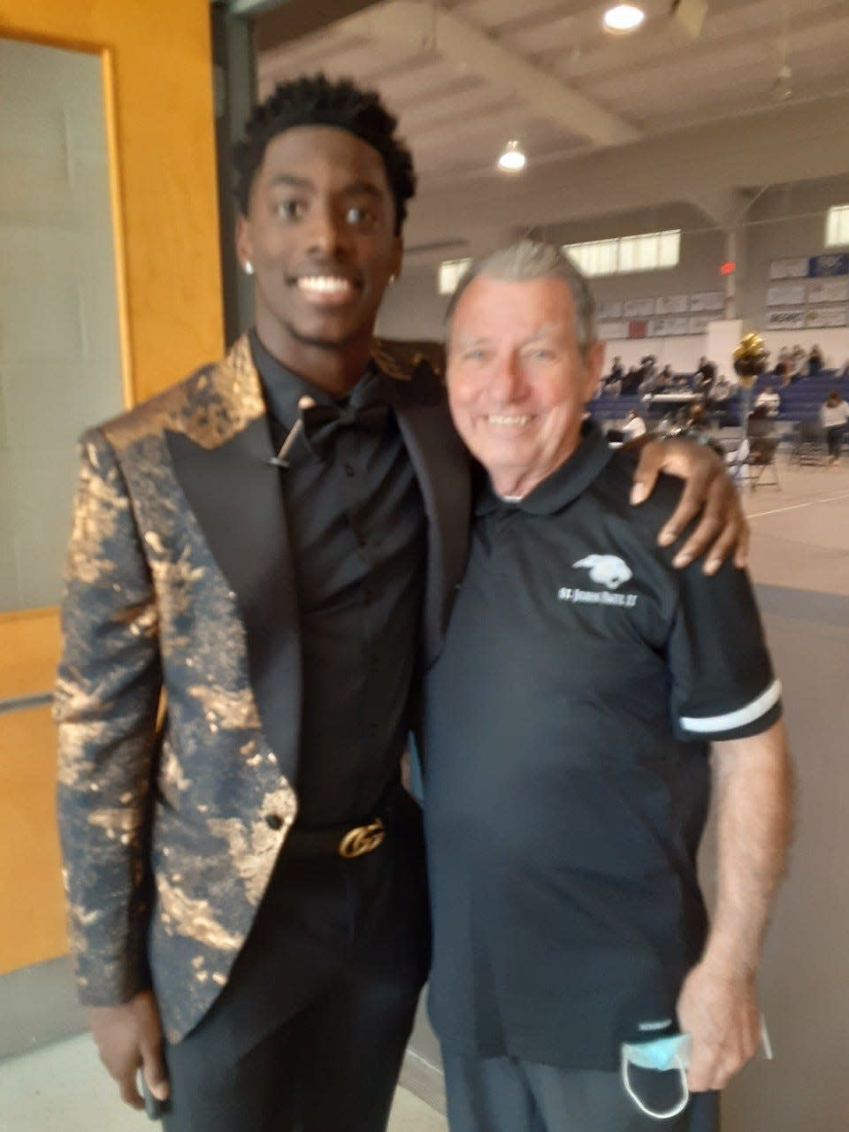 New Detroit Lions cornerback Terrion Arnold and his high school janitor, Joe Biggs.