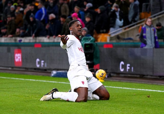 Kobbie Mainoo celebrates his winner against Wolves