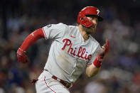 Philadelphia Phillies' Bryce Harper doubles in the eighth inning of a baseball game against the Washington Nationals, Wednesday, Aug. 4, 2021, in Washington. Travis Jankowski scored on the play. (AP Photo/Patrick Semansky)