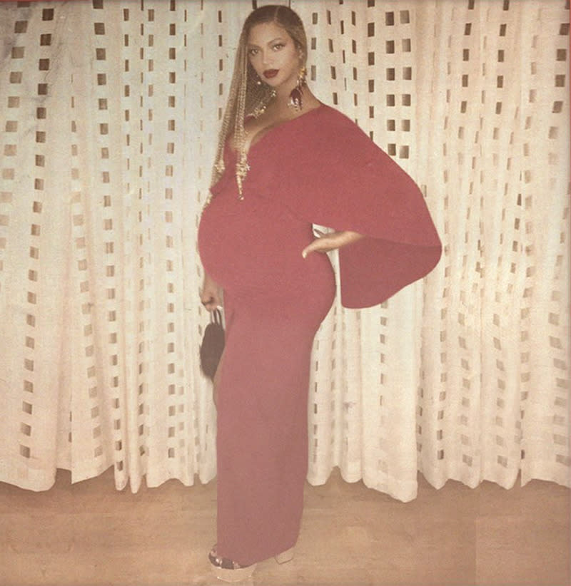Pregnant Beyoncé in red at a birthday party