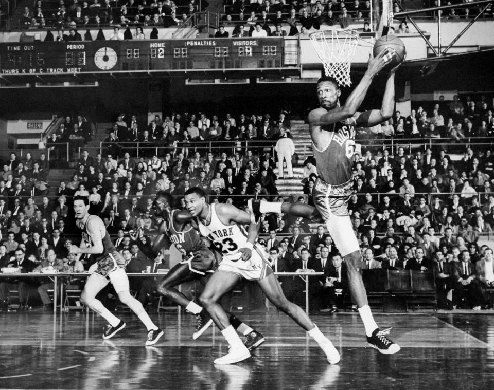 Bill Russell grabs a rebound. He was really, really good at that. (Charles Payne/NY Daily News Archive via Getty Images)