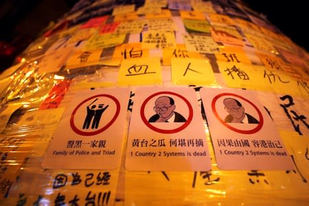 Protest at Yuen Long MTR station, the scene of an attack by suspected triad gang members a month ago