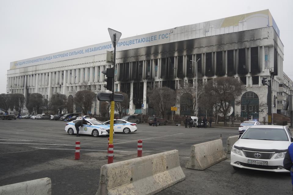 A view of the Media center building after clashes in the central square blocked by Kazakhstan troops and police in Almaty, Kazakhstan, Tuesday, Jan. 11, 2022. Life in Almaty, which was affected with the violence the most during protests, started returning to normal this week, with public transport resuming operation and malls reopening. (Vladimir Tretyakov/NUR.KZ via AP)