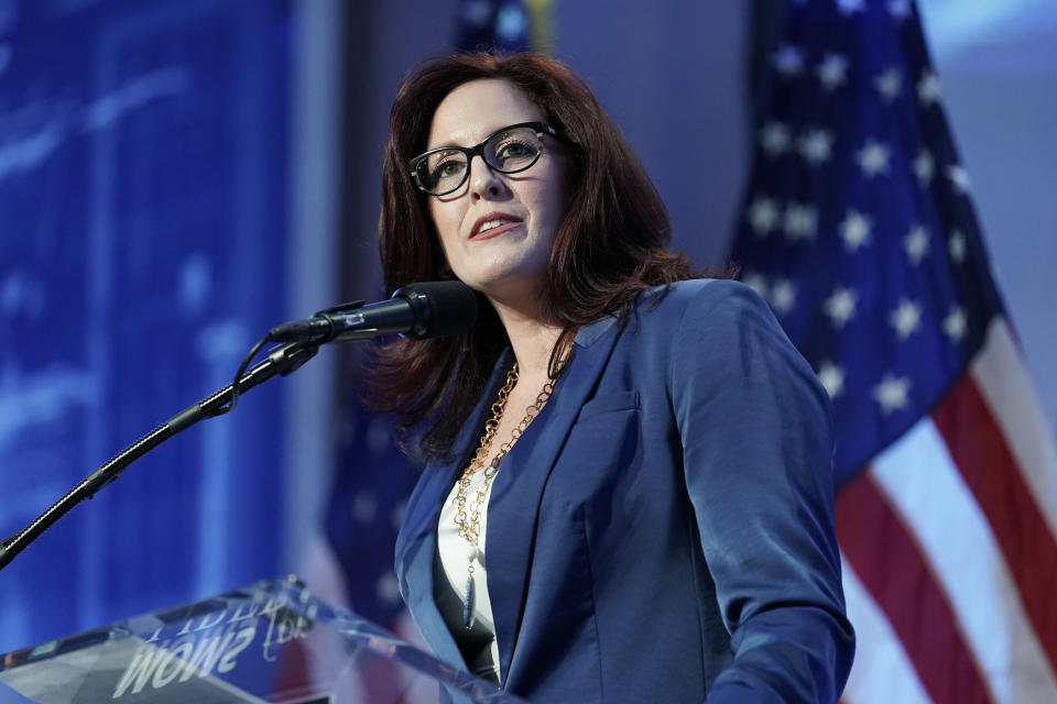 Moms for Liberty co-founder Tiffany Justice speaks at their meeting, in Philadelphia, Friday, June 30, 2023. (AP Photo/Matt Rourke)