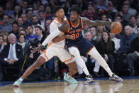 New York Knicks forward Julius Randle (30) drives against/ Atlanta Hawks guard Jarrett Culver during the first half of an NBA basketball game Wednesday, Dec. 7, 2022, at Madison Square Garden in New York. (AP Photo/Mary Altaffer)