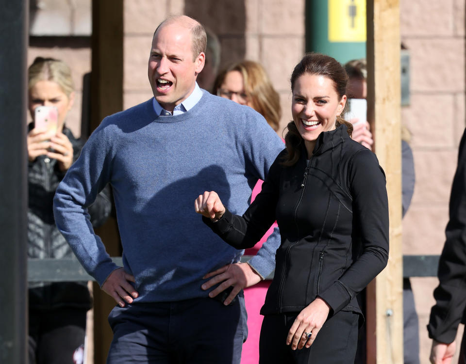 LONDONDERRY, NORTHERN IRELAND - SEPTEMBER 29: Prince William, Duke of Cambridge and Catherine, Duchess of Cambridge laugh after the Duchess kicks a rugby ball during their tour of the City of Derry Rugby Club on September 29, 2021 in Londonderry, Northern Ireland. (Photo by Chris Jackson/Getty Images)