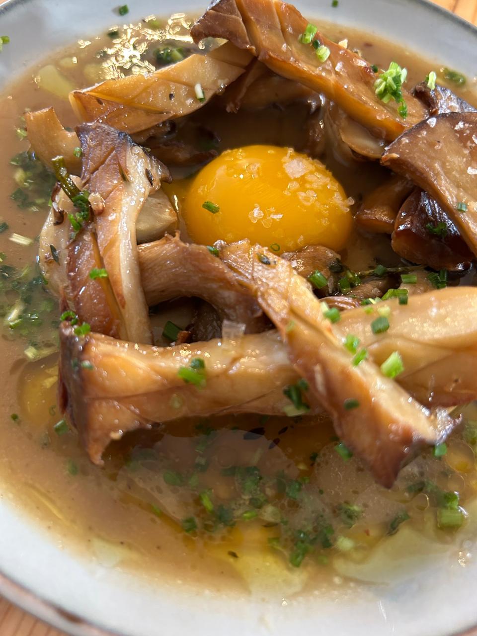 Roasted King Mushrooms "Basque Style" at The Daley Trade in Titusville come roasted and chicken and sherry reduction with fresh herbs and a Lake Meadows Naturals egg yolk.