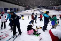 People visit indoor ski park at Qiaobo Ice and Snow World in Shaoxing
