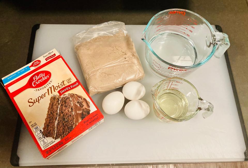 Betty Crocker cake mix and ingredients on cutting board