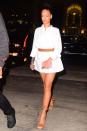 <p>In a white shirtdress, brown belt and matching Aquazzura fringe heeled sandals while out to dinner with Drake at Nobu in NYC.</p>