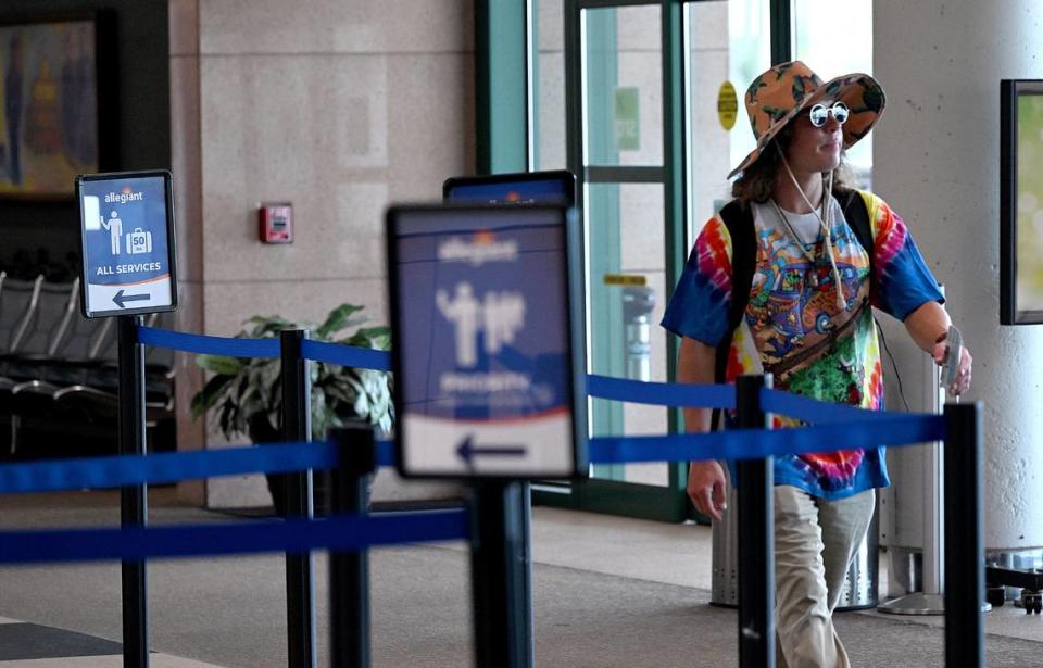 A traveler walks through the terminal at the Sarasota Bradenton International Airport, Sept. 25, 2023.