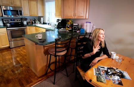 Kelly Pfaff talks about her husbands John's death during an interview at her home in Park City