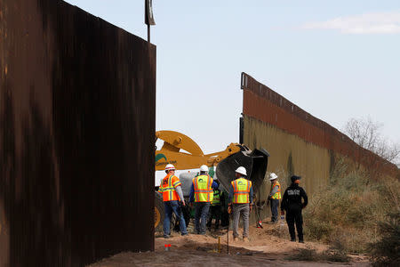 U.S. Customs and Border Protection replace a 2.25-mile section of US-Mexico border with new wall construction near Calexico, California, U.S, as seen from Mexicali, Mexico February 22, 2018. REUTERS/Jorge Duenes
