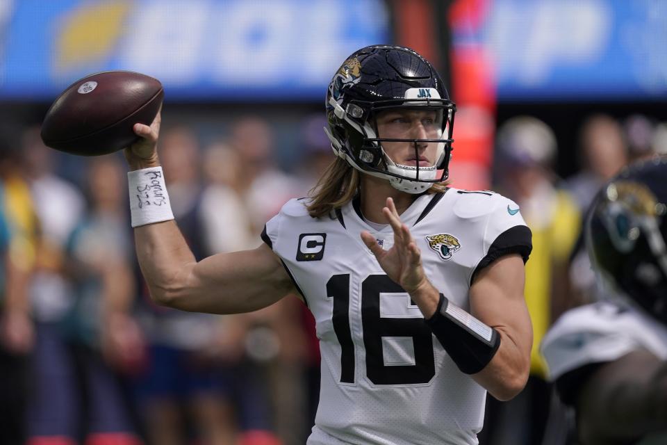 Jacksonville Jaguars quarterback Trevor Lawrence (16) passes against the Los Angeles Chargers during the first half of an NFL football game in Inglewood, Calif., Sunday, Sept. 25, 2022. (AP Photo/Mark J. Terrill)