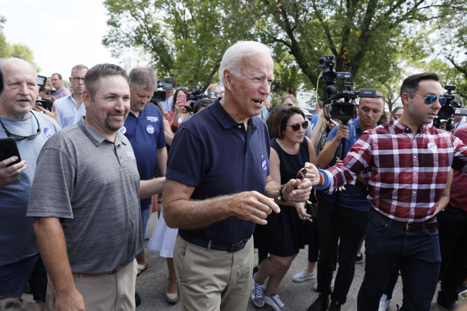 Democratic presidential candidate former Vice President Joe Biden greets local residents during the Hawkeye Area Labor Council Labor Day Picnic, Monday, Sept. 2, 2019, in Cedar Rapids, Iowa. (AP Photo/Charlie Neibergall)