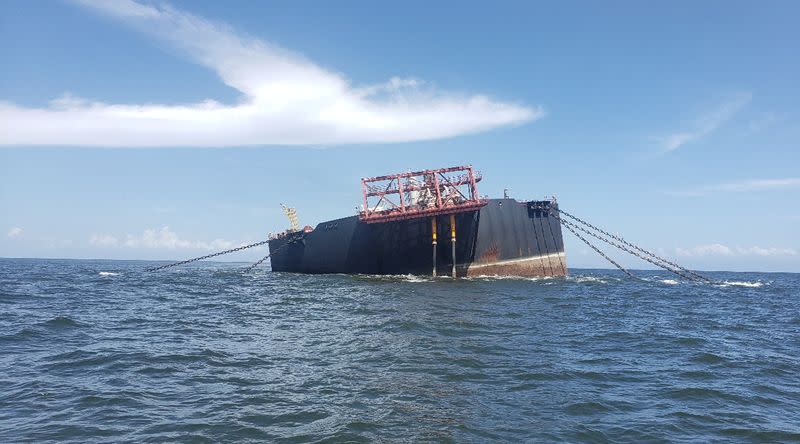 The Nabarima floating storage and offloading (FSO) facility is seen tilted in the Paria Gulf