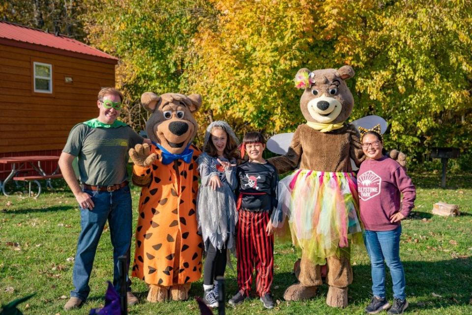 People in costumes at Yogi Bear’s Jellystone Park Camp-Resort at Lake Monroe.