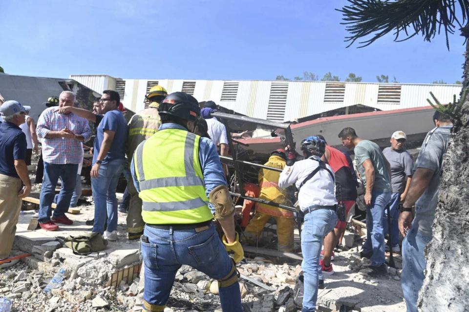 Rescue workers search for survivors amid debris after the roof of a church collapsed during a Sunday Mass in Ciudad Madero, Mexico, Sunday, Oct. 1, 2023. The Bishop of the Roman Catholic Diocese of Tampico said the roof caved in while parishioners were receiving communion. (Alejando de Angel/El Sol de Tampico via AP)