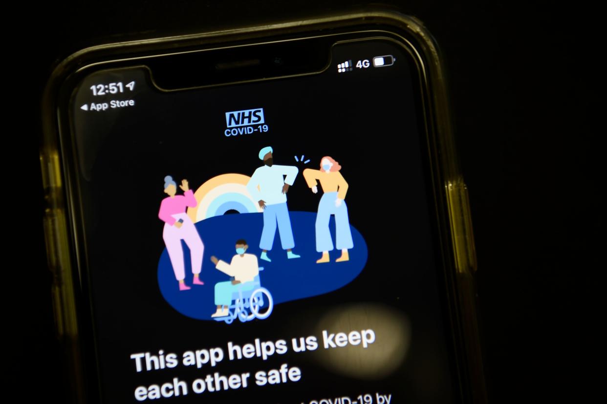 The newly launched contact tracing app, which uses Bluetooth technology to alert users if they spend 15 minutes or more within two metres (six feet) of another user who subsequently tests positive for the nove coronavirus COVID-19, is pictured on a smartphone in London on September 24, 2020. - The British government on Thursday finally launches its troubled smartphone app to help track the coronavirus in England and Wales -- four months behind schedule and with cases once again surging. (Photo by DANIEL LEAL-OLIVAS / AFP) (Photo by DANIEL LEAL-OLIVAS/AFP via Getty Images)