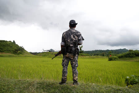 A Myanmar soldier stands near Maungdaw, north of Rakhine state, Myanmar September 27, 2017. REUTERS/Soe Zeya Tun