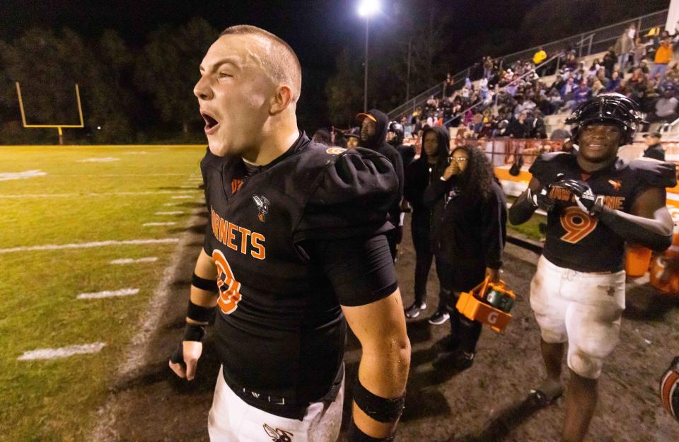 Hawthorne Hornets Andrew Zock (0) celebrates as the Hornets rolled over the Tigers. The Hawthorne Hornets hosted the Blountstown Tigers at Hawthorne High School in Hawthorne, FL on Thursday, November 30, 2023 in the Class 1R State Semis Football. The Hornets defeated the Tigers 49-0 and advance to the State Championship game next Thursday in Tallahassee. [Doug Engle/Gainesville Sun]