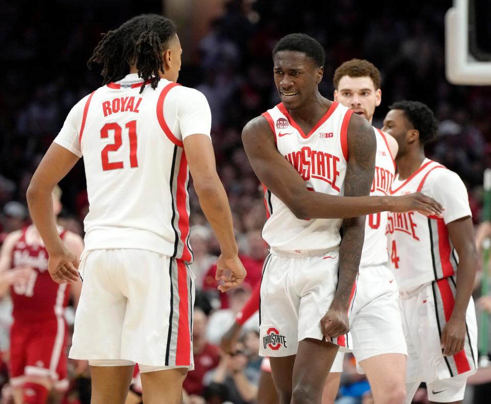 Ohio State's Devin Royal (21) and Scotty Middleton celebrate during Thursday's win over Nebraska.