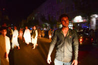 <p>People react on the street, following a suicide bomb attack at a Shiite mosque in Herat on August 1, 2017. (Photo: Hoshang Hashimi/AFP/Getty Images) </p>