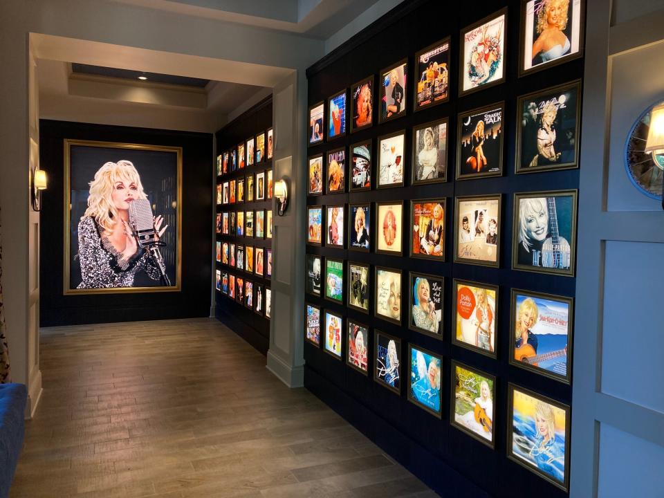 Dolly Parton's albums on display in a hallway at the Dollywood DreamMore Resort.