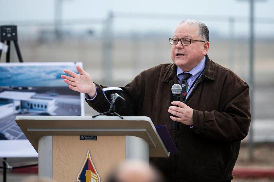 Merced Deputy City Manager Frank Quintero speaks during a groundbreaking ceremony for a $17 million dollar airport terminal replacement project at the Merced Yosemite Regional Airport in Merced, Calif., on Thursday, Dec. 21, 2023. The project will include updates to the existing 1940s-era terminal as well as the construction of a new energy-efficient and sustainable facility. Andrew Kuhn/akuhn@mercedsun-star.com