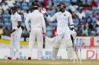 West Indies Marlon Samuels exchanges words with England's Ian Bell Action Images via Reuters / Jason O'Brien