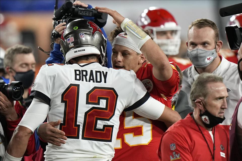 Tom Brady and Patrick Mahomes occupy the top two spots on the NFLPA's yearly player sales list. (AP Photo/David J. Phillip)