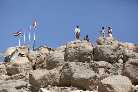 Pro-government soldiers stand at their position overlooking the Marib Dam near the the northern city of Marib, Yemen November 3, 2017. REUTERS/Ali Owidha